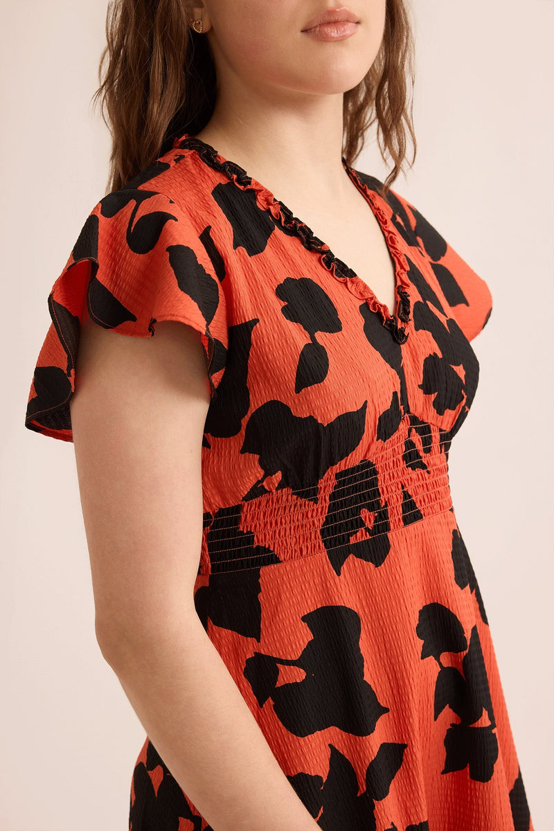 Jungle Serenade Empire Waist Dress In Orange